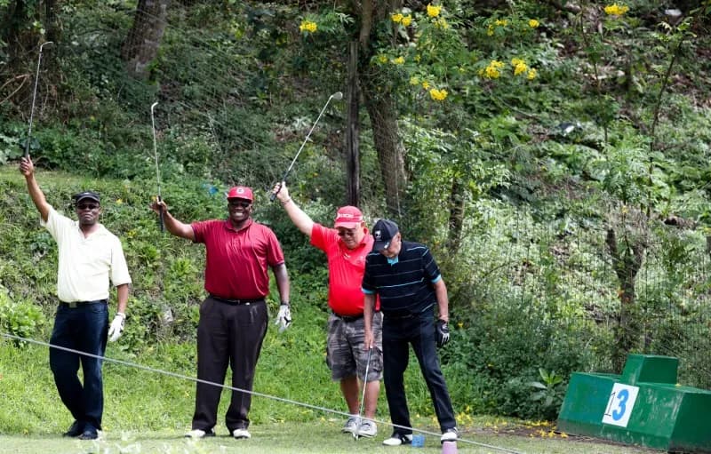 Members celebrating together at the end of a round